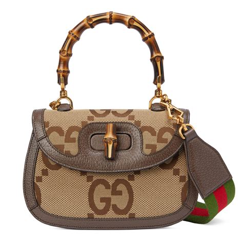 gucci canvas bag with bamboo handle|gucci bamboo 1947 collection.